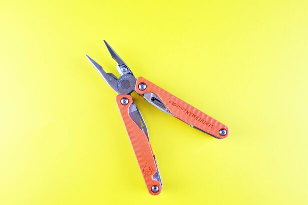 A Swiss-made multi-tool with pliers and multiple folding tools extended