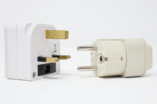 A travel adapter plugged into a European power outlet with multiple USB ports