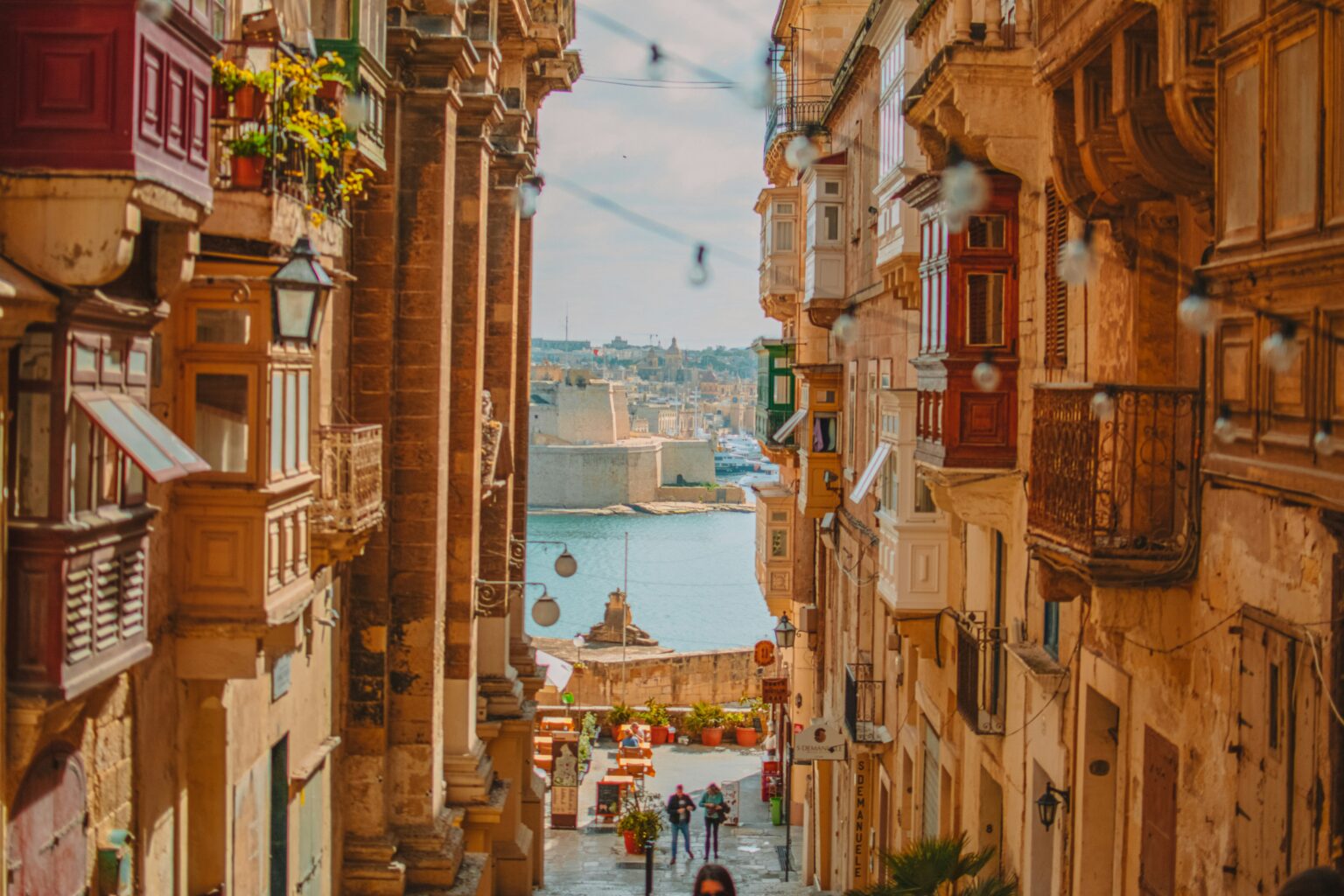 Valletta Malta seafront with restaurants and tables
