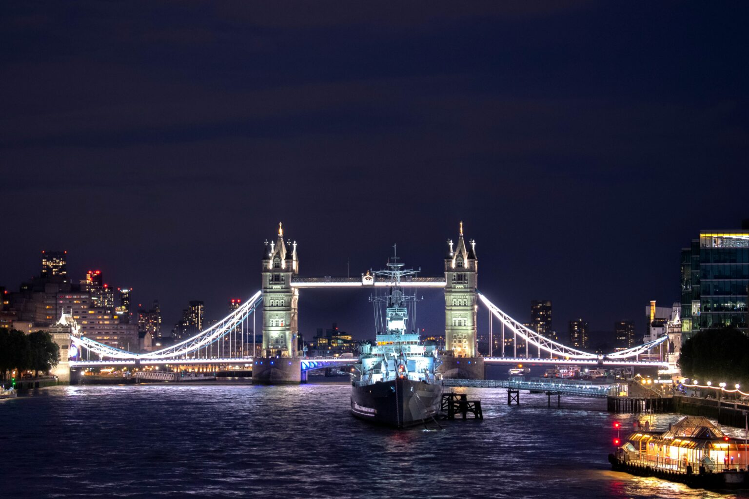 London's Tower Bridge across the Thames with the City skyline behind