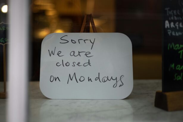 Closed retail storefronts on a quiet European Sunday street — most continental European countries restrict Sunday trading by national law