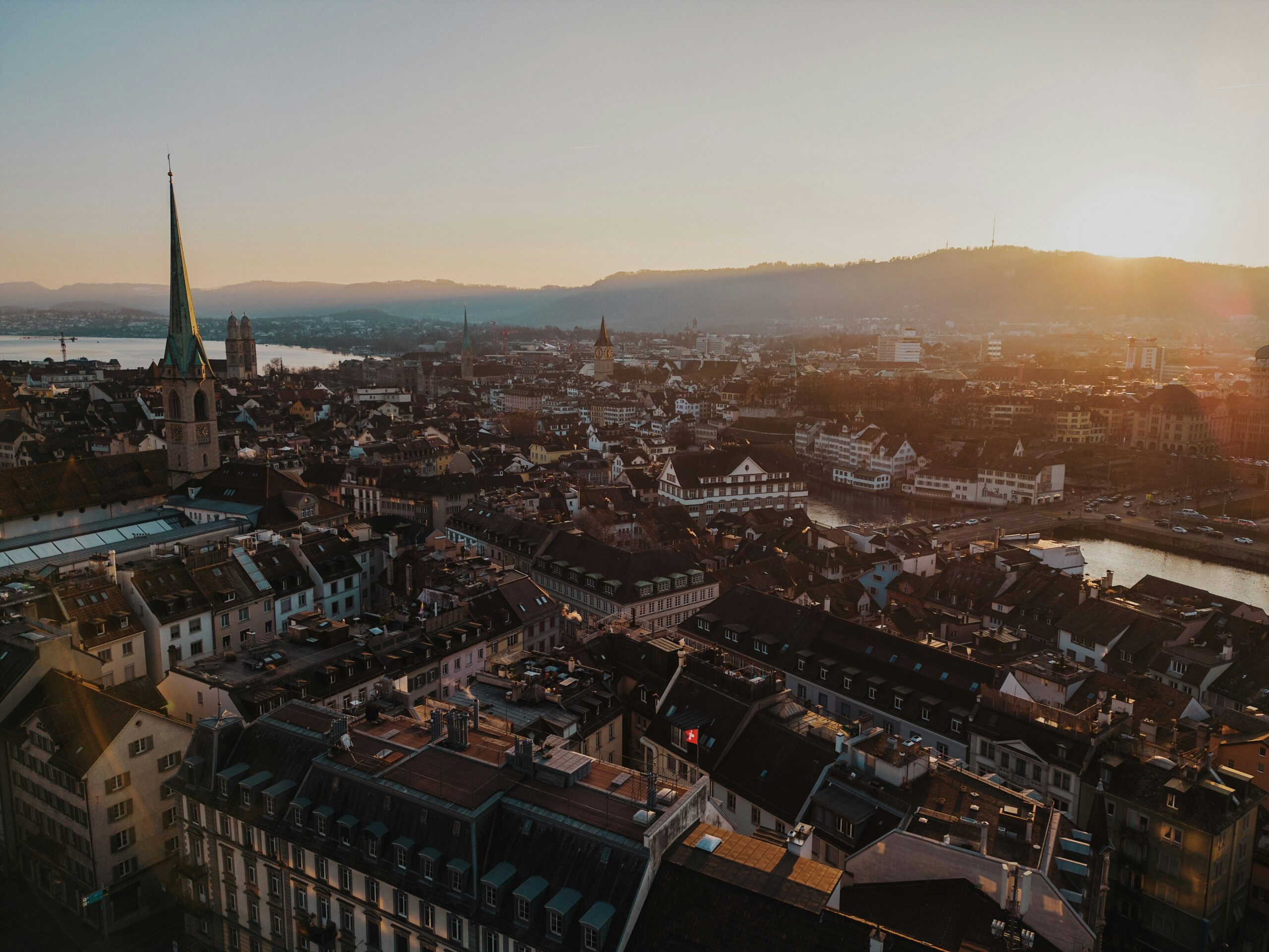 Zurich's old town and Limmat river under blue sky — Switzerland's most expensive city has surprising free and budget options